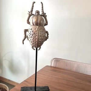 Silver beetle sculpture